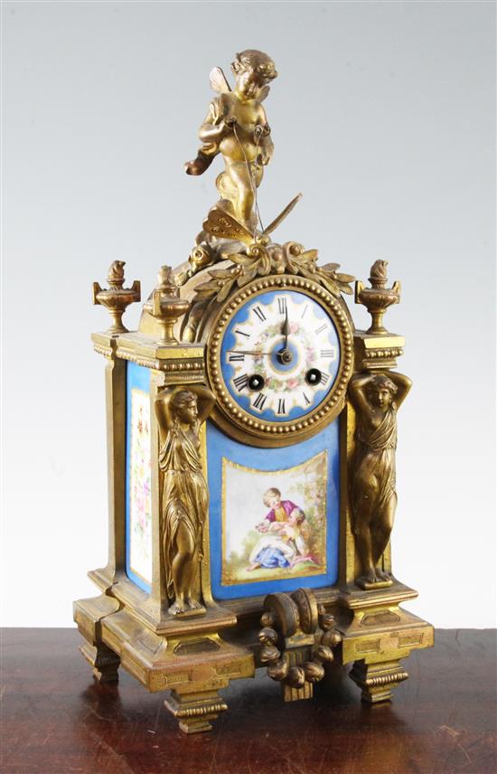 A 19th century French ormolu and porcelain mantel clock 16in.